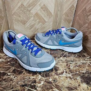 Nike women's Revolution 2 running shoes size 9.5.    087
